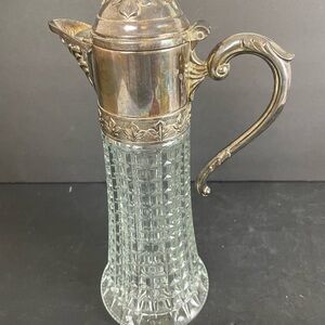 Elegant Silver and Glass Pitcher